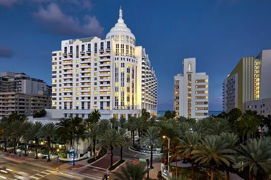 The exterior photo of Loews in Miami in the evening